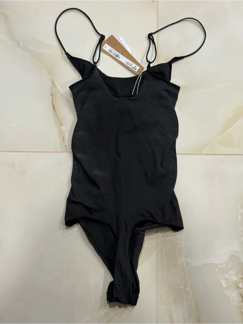 SKIMS Black Kids One-Piece Bodysuit with Adjustable Straps